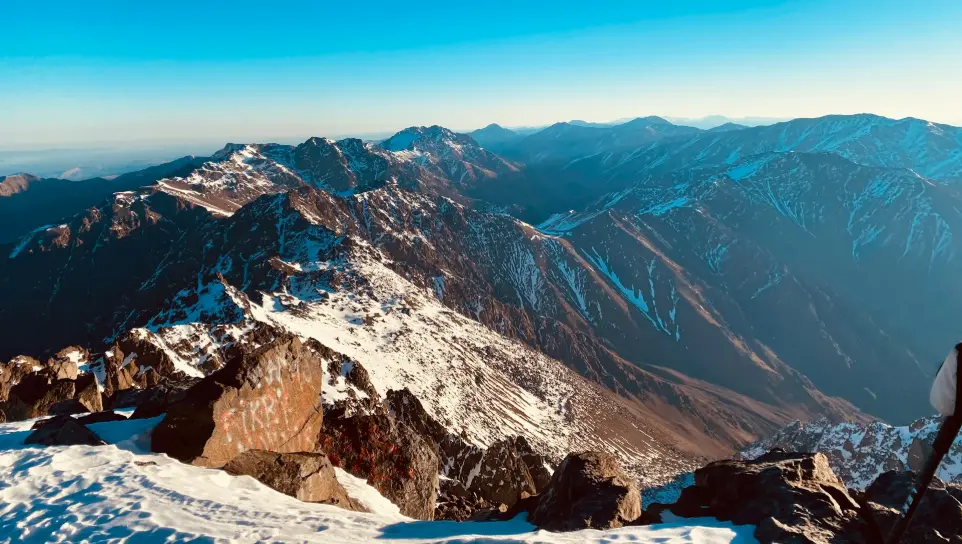 snow covered mountain under blue sky during daytime